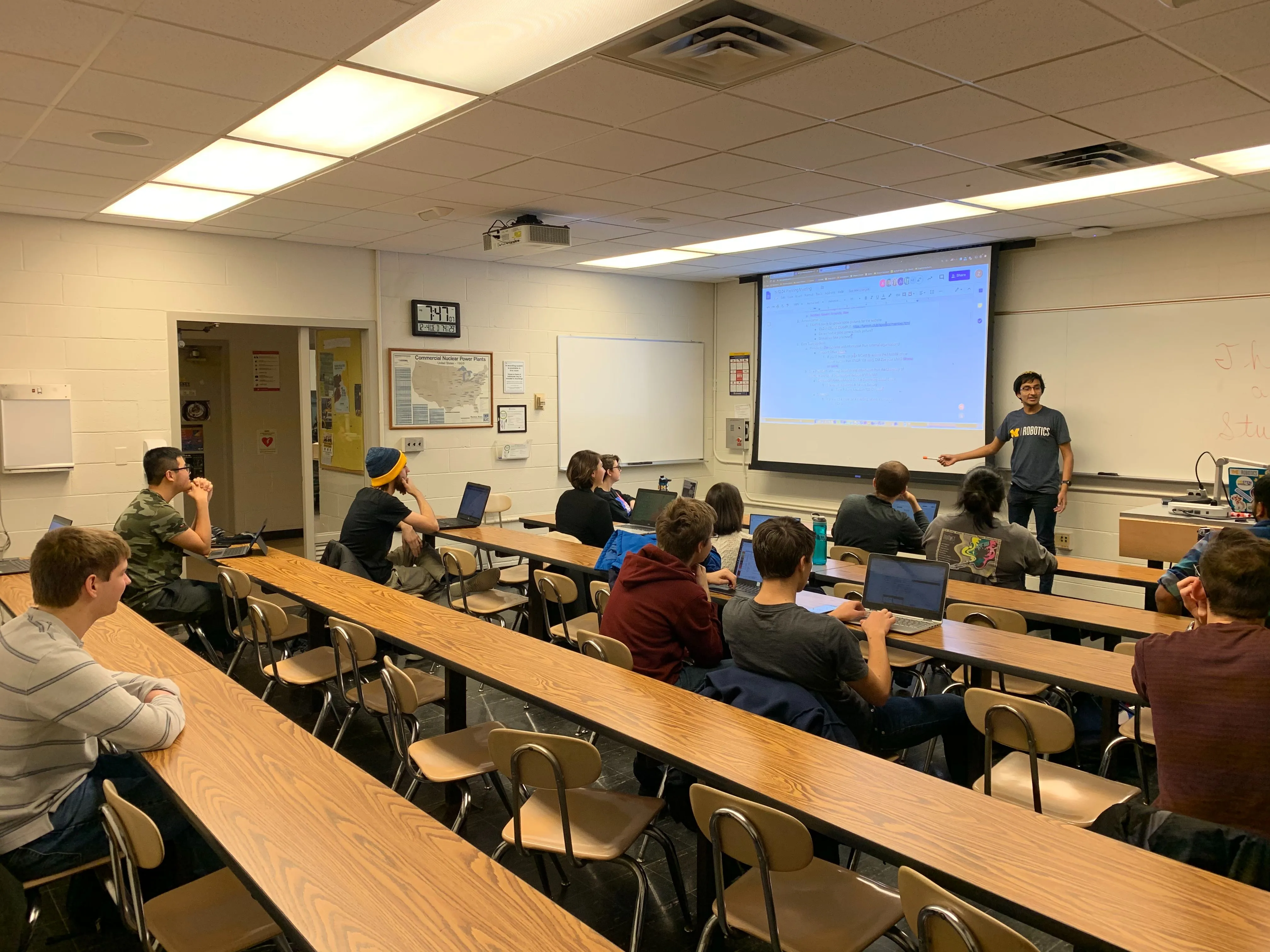 FAMNM members conduct a meeting in a classroom